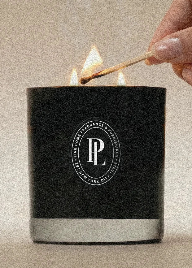 A candle lit before guests arrive